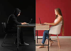 hacker facing woman with computer